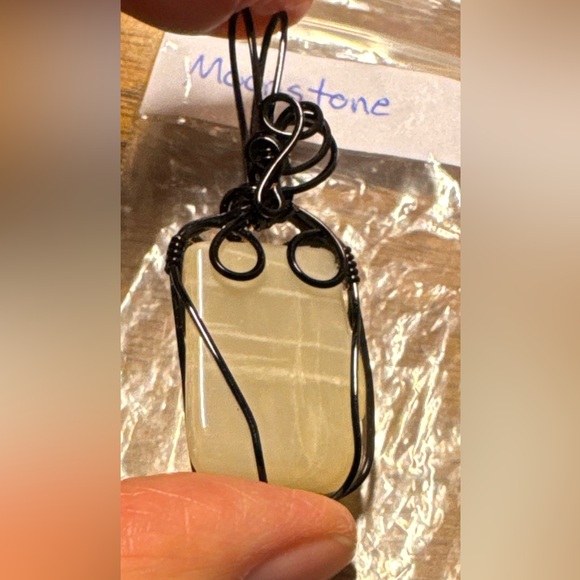 Beautiful Moonstone pendant in a black wrap (jewelers grade wire) - Picture 4 of 16